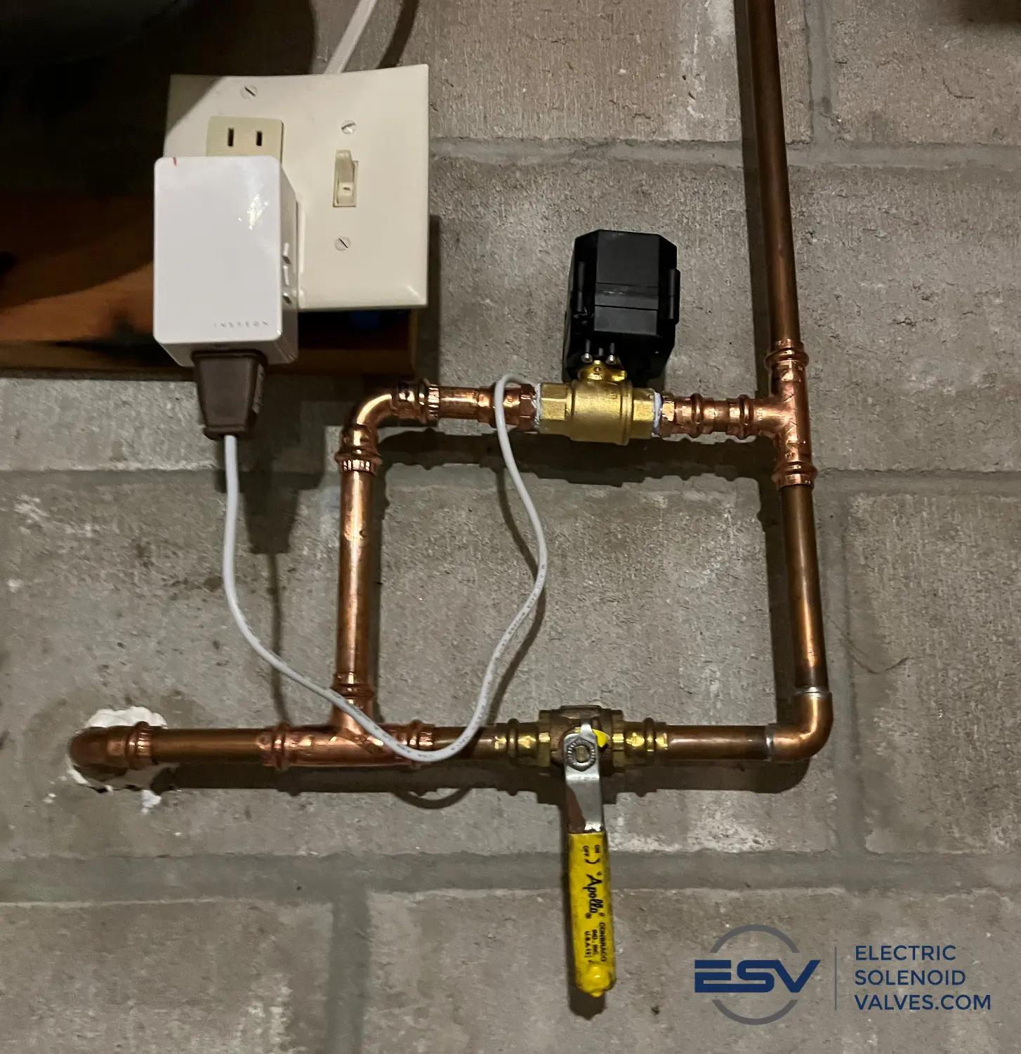 Customer photo of a 1/2" Brass Electric Ball Valve used to control an outdoor water faucet with Alexa